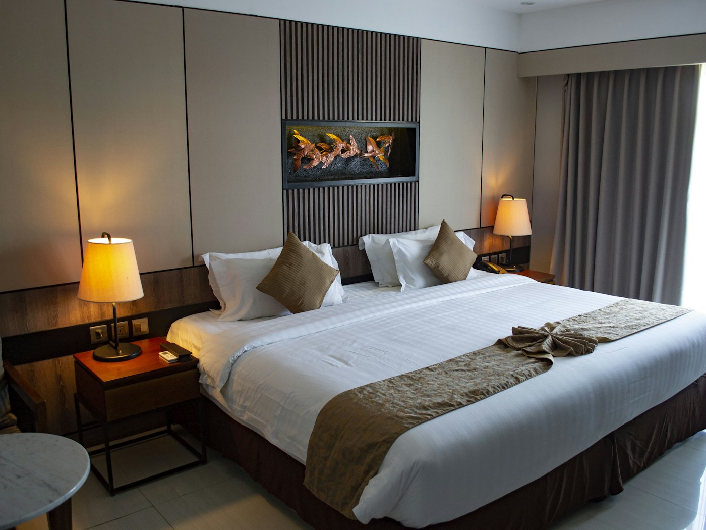 Heritage Hall boutique hotel suite with warm lighting